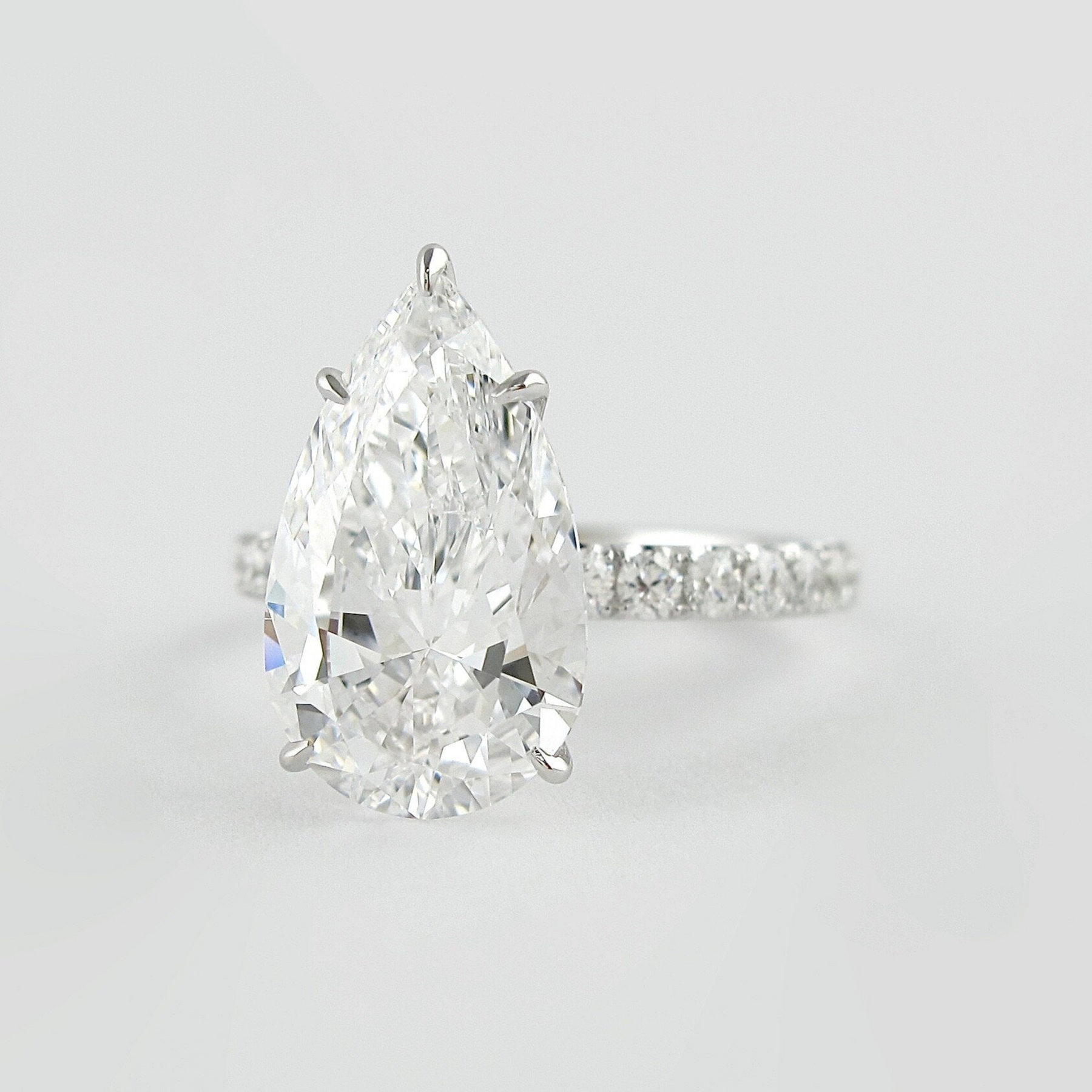 4 Carat Pear Cut Hidden Halo Engagement Ring with Pave Band - Evara Jewelry LLC