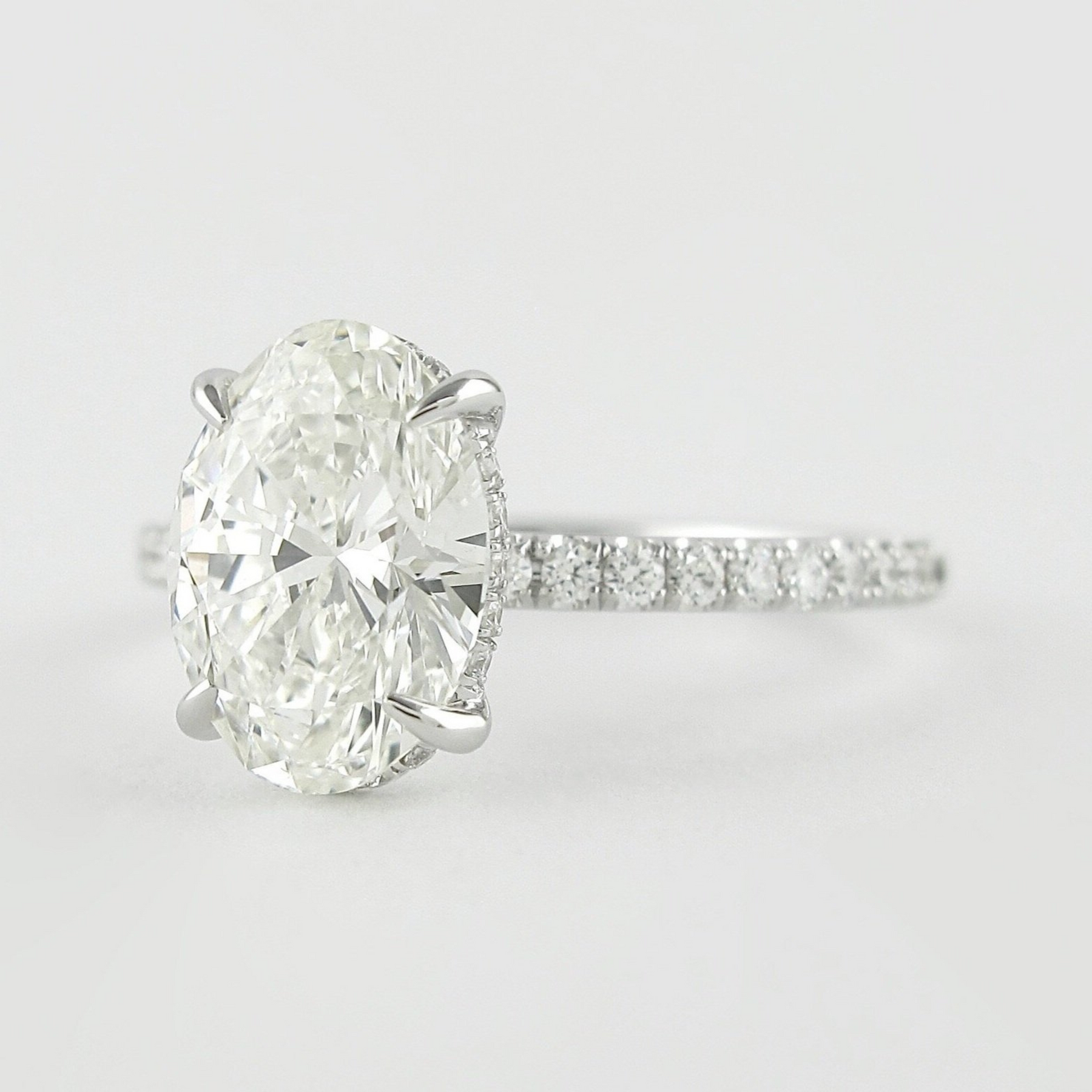 2.50 Carat Oval Cut Prong set Diamond Wedding Ring with Hidden Halo & Pave Diamond Band - Evara Jewelry LLC