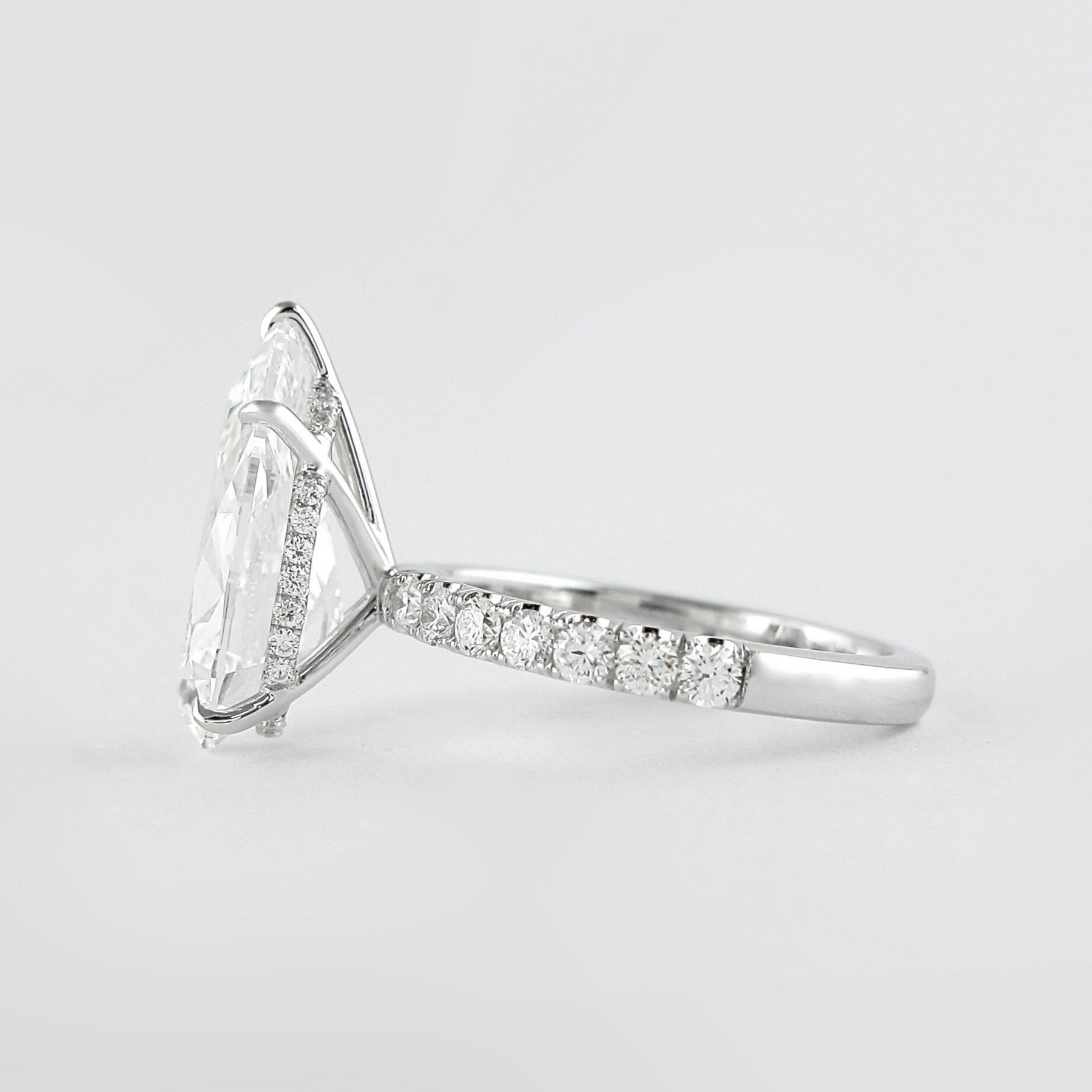 4 Carat Pear Cut Hidden Halo Engagement Ring with Pave Band - Evara Jewelry LLC
