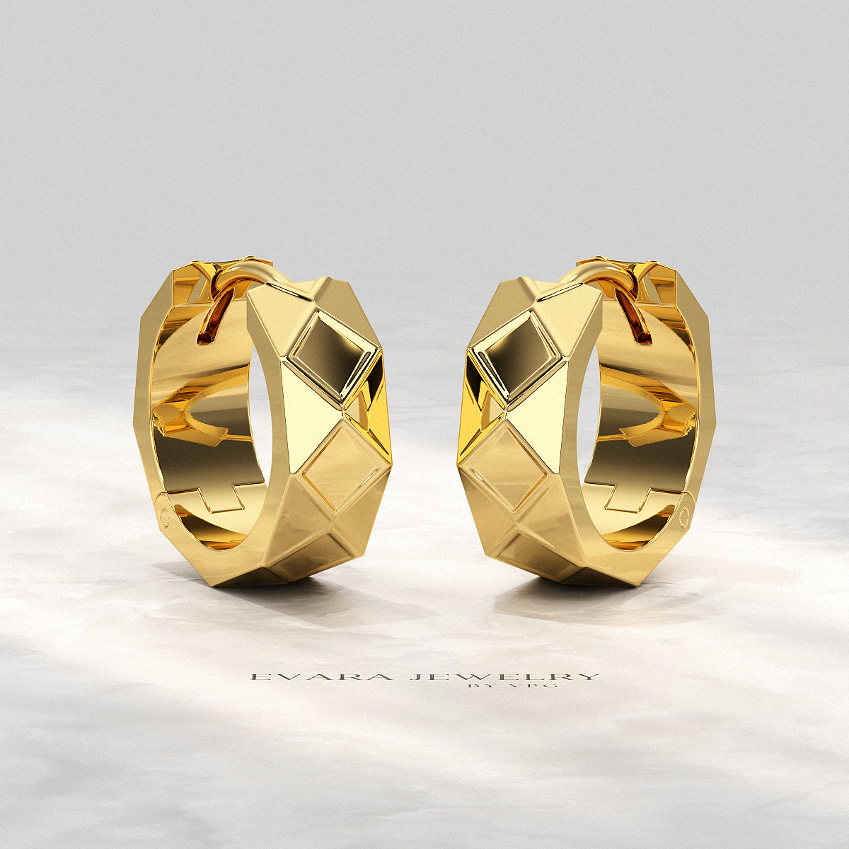 Abstract-style geometric hoop earrings on display stand