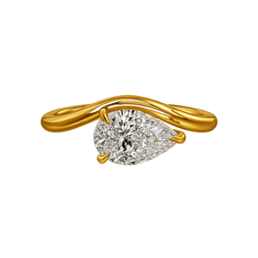 Gold east west ring with a pear-shaped diamond