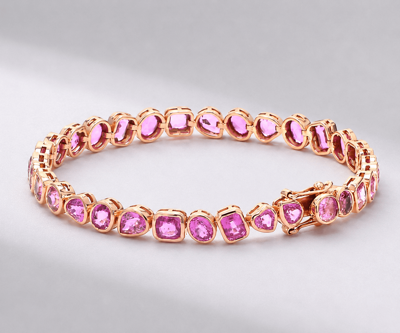 12 Carat Natural Pink Sapphire Mixed-Shape Tennis Bracelet in 14K Gold - Evara Jewelry LLC