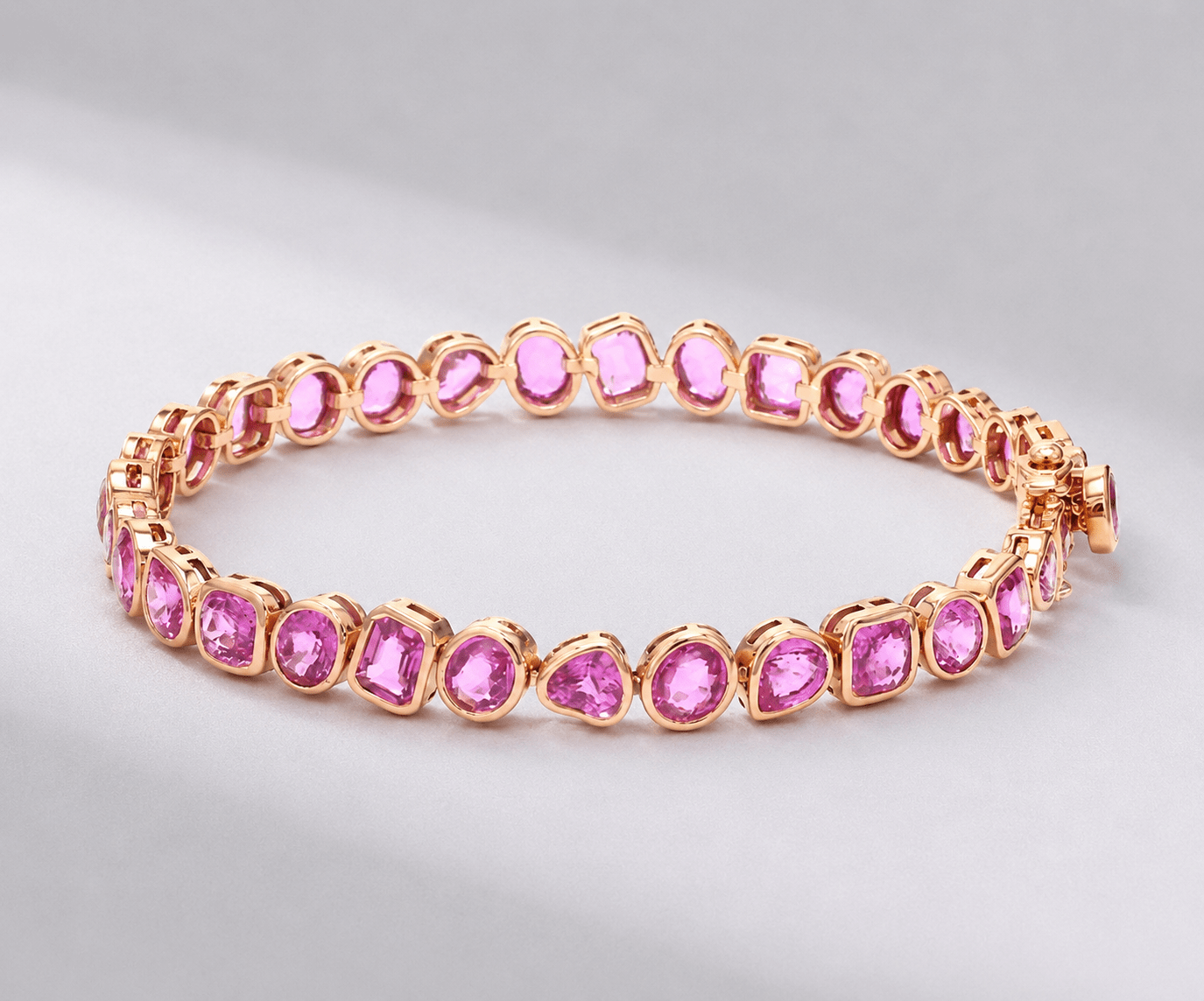 12 Carat Natural Pink Sapphire Mixed-Shape Tennis Bracelet in 14K Gold - Evara Jewelry LLC