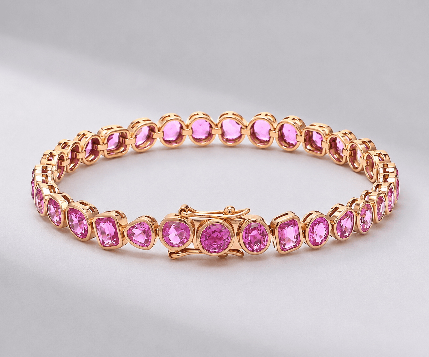 12 Carat Natural Pink Sapphire Mixed-Shape Tennis Bracelet in 14K Gold - Evara Jewelry LLC