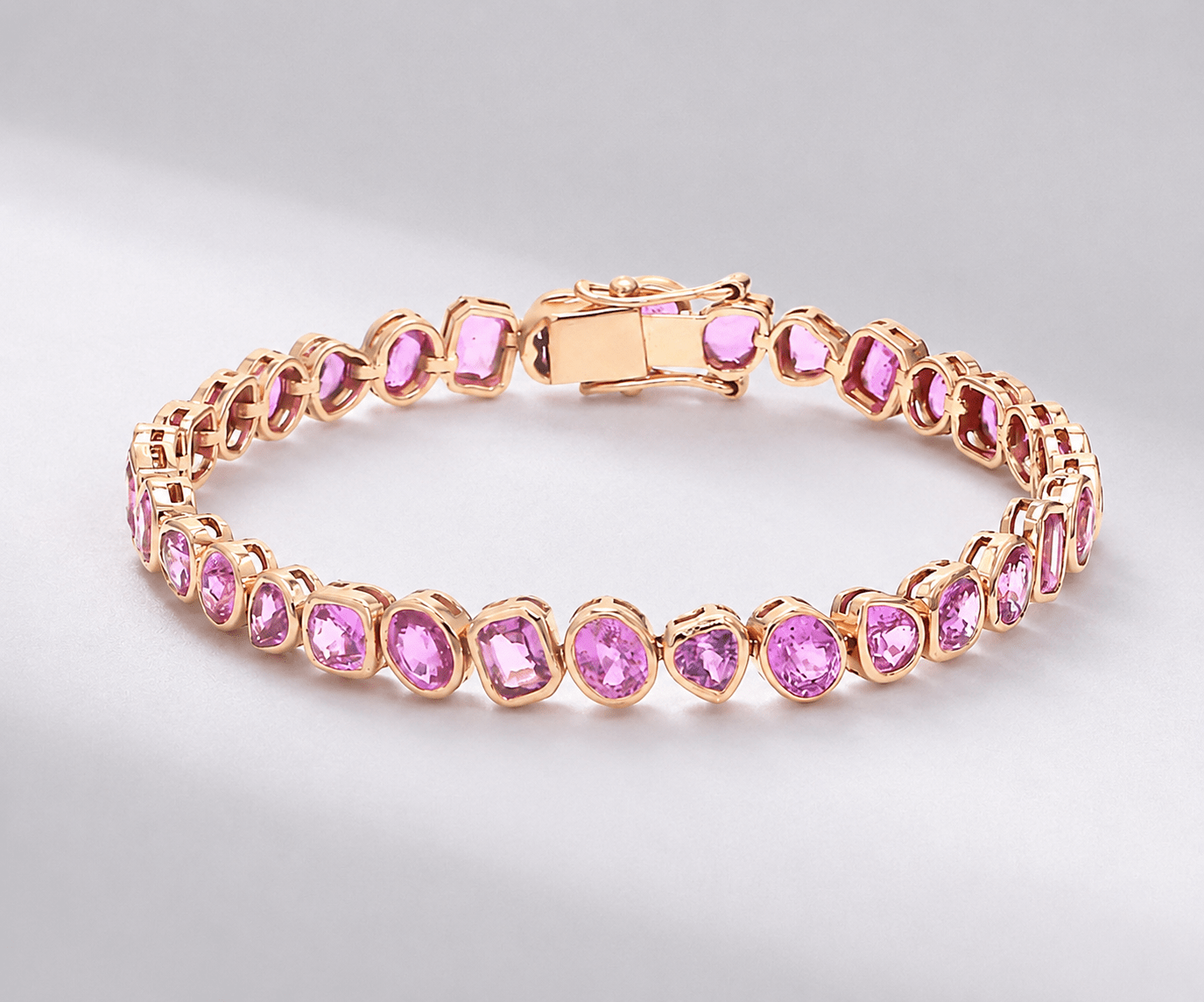 12 Carat Natural Pink Sapphire Mixed-Shape Tennis Bracelet in 14K Gold - Evara Jewelry LLC