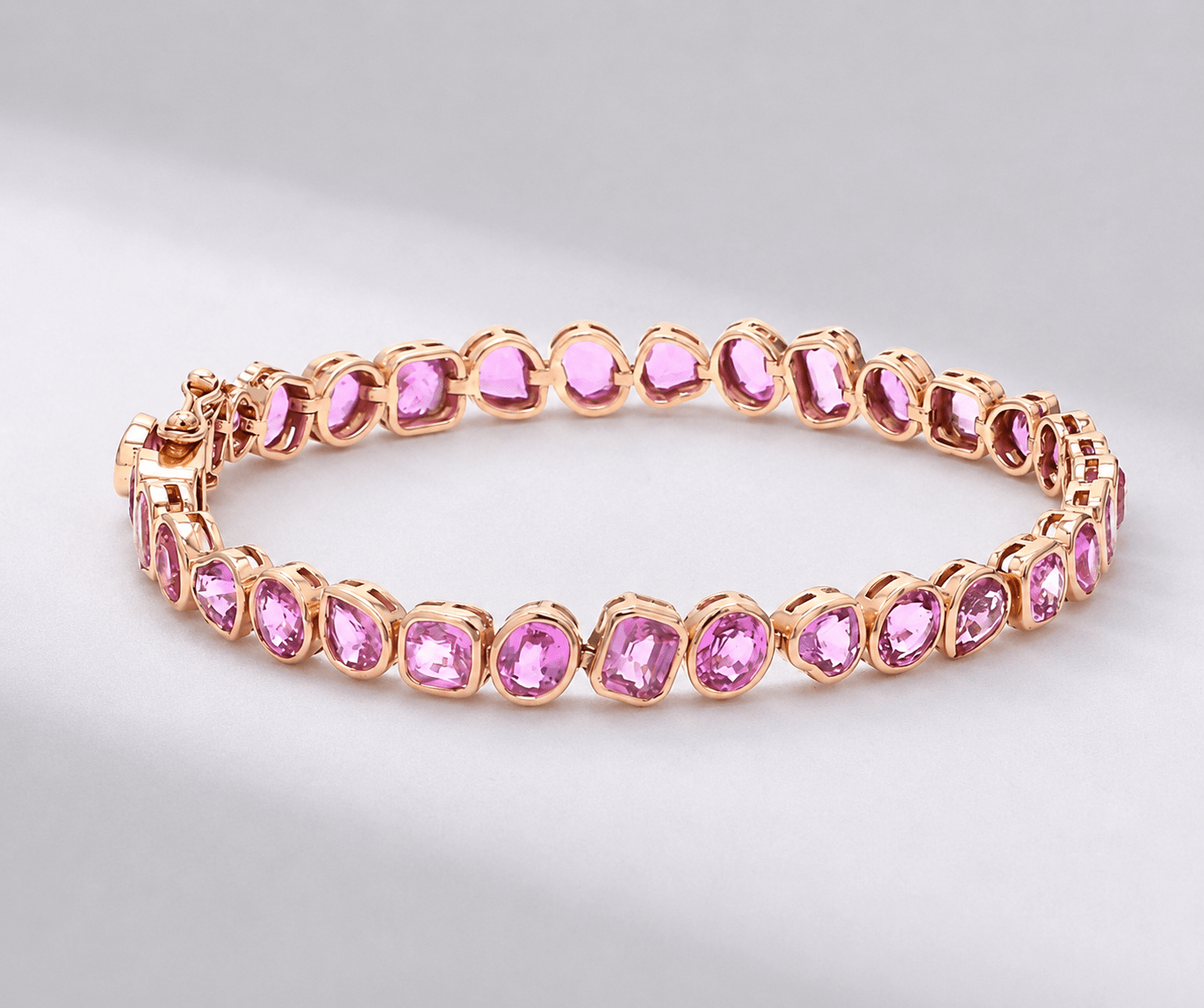 12 Carat Natural Pink Sapphire Mixed-Shape Tennis Bracelet in 14K Gold - Evara Jewelry LLC