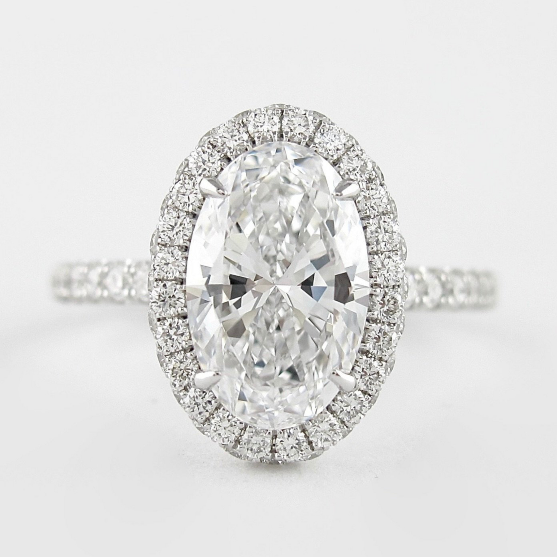 2 Carat Classic Oval Cut Diamond Halo Engagement Ring with Pave Band