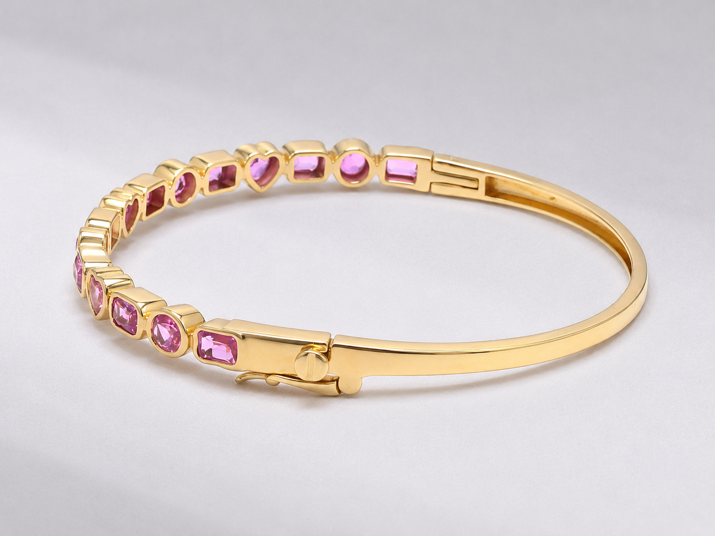 Natural Pink Sapphire Bezel Set Cuff Bracelet in 18K Gold