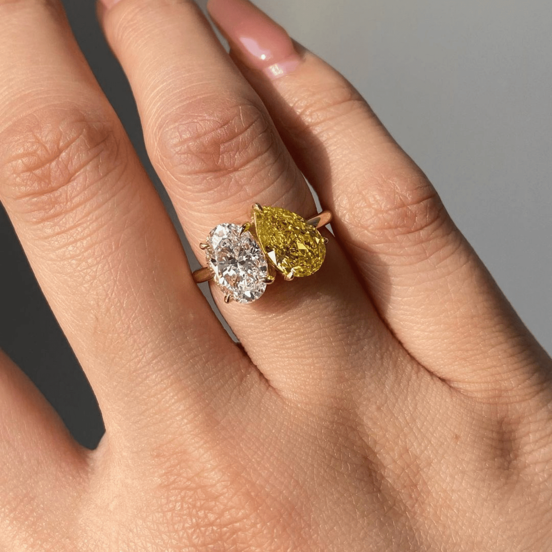 2.25 Carat Oval Diamond & Pear Cut Intense Yellow Diamond Toi Et Moi Two Stone Ring - Evara Jewelry LLC