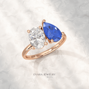 2.40 Carat Oval Cut Diamond & Pear Cut Blue Sapphire Toi Et Moi Two Stone Ring - Evara Jewelry LLC