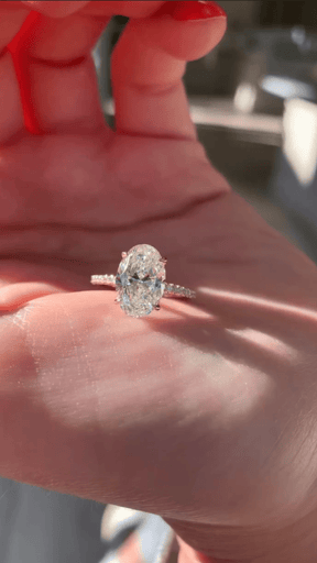 2.50 Carat Oval Cut Prong Set Lab Grown Diamond Engagement Ring with Pave Diamond Band - Evara Jewelry LLC