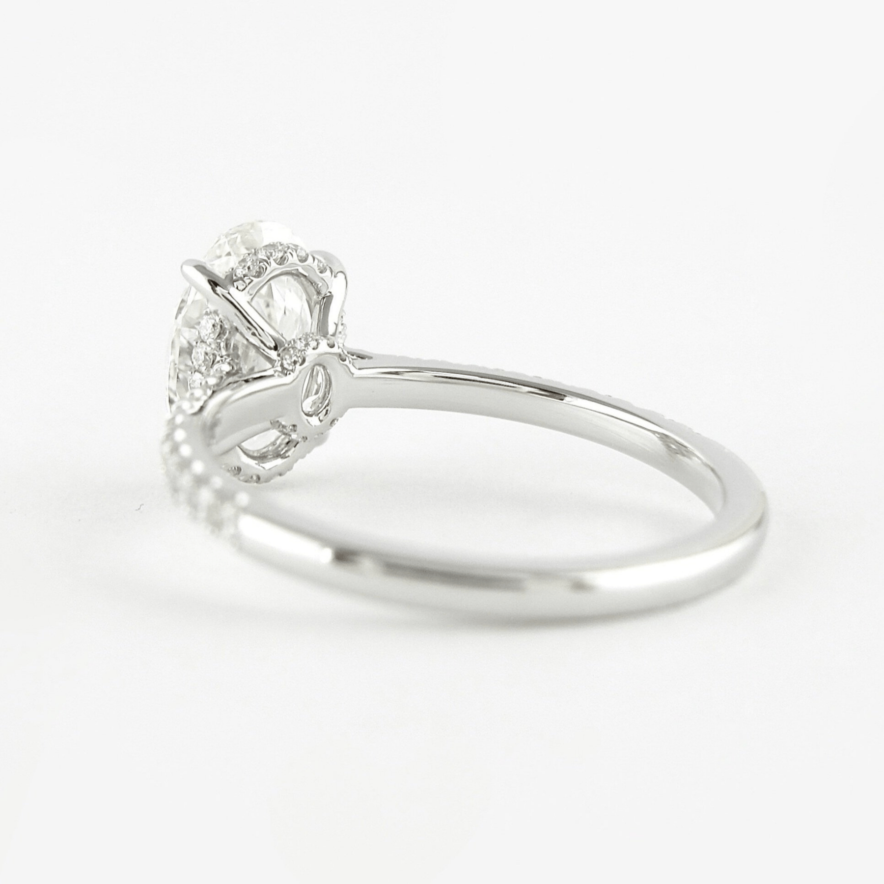 2.50 Carat Oval Cut Prong Set Lab Grown Diamond Engagement Ring with Pave Diamond Band - Evara Jewelry LLC