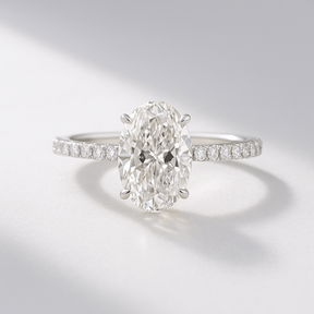 2.50 Carat Oval Cut Prong Set Lab Grown Diamond Engagement Ring with Pave Diamond Band - Evara Jewelry LLC
