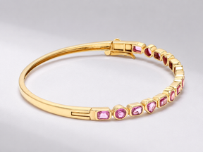 Natural Pink Sapphire Bezel Set Cuff Bracelet in 18K Gold