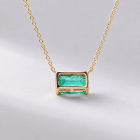 Natural East-West Emerald-Cut Emerald Pendant Necklace in 14K Gold