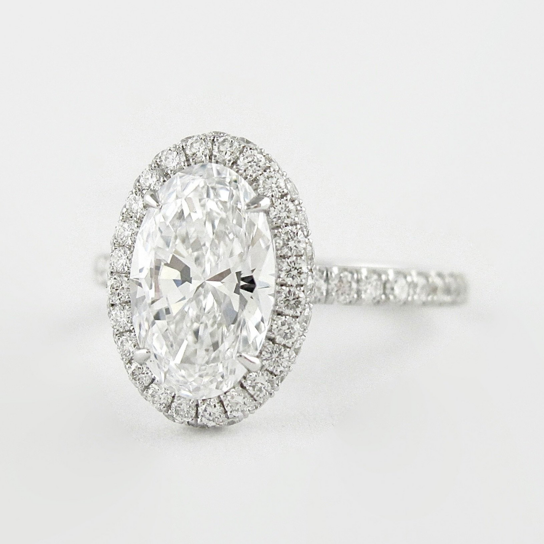 2 Carat Classic Oval Cut Diamond Halo Engagement Ring with Pave Band