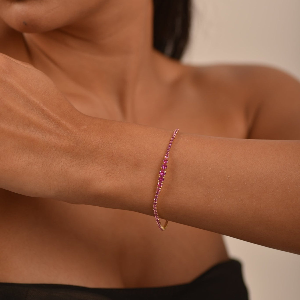 Pink Sapphire Graduated Tennis Bracelet in Solid Gold