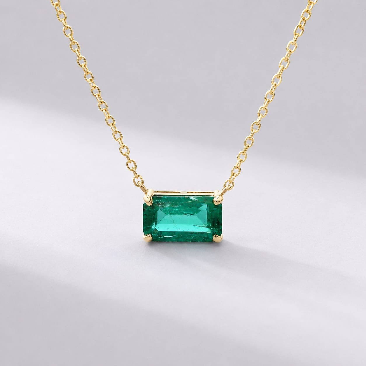 Natural East-West Emerald-Cut Emerald Pendant Necklace in 14K Gold