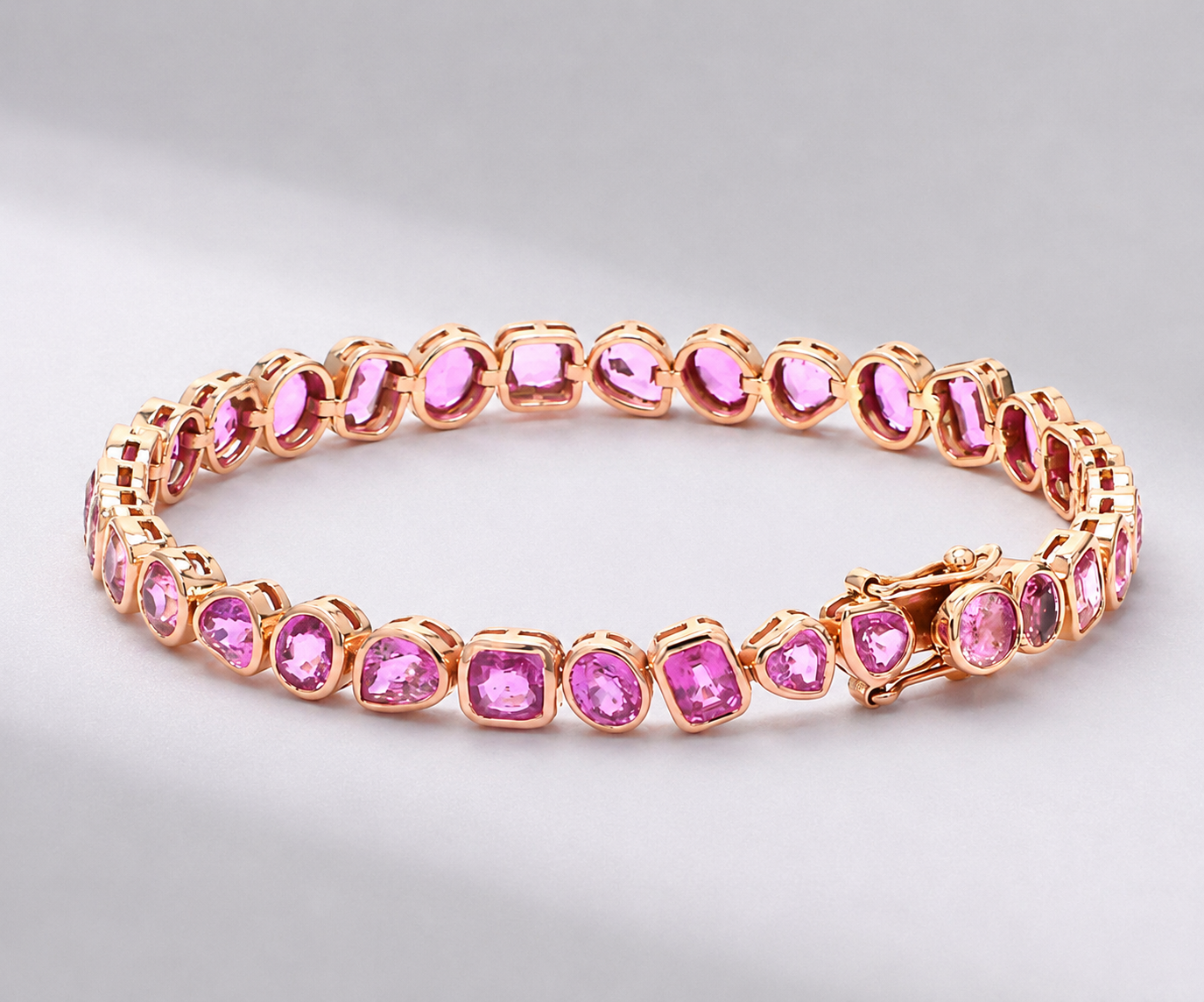 12 Carat Natural Pink Sapphire Mixed-Shape Tennis Bracelet in 14K Gold