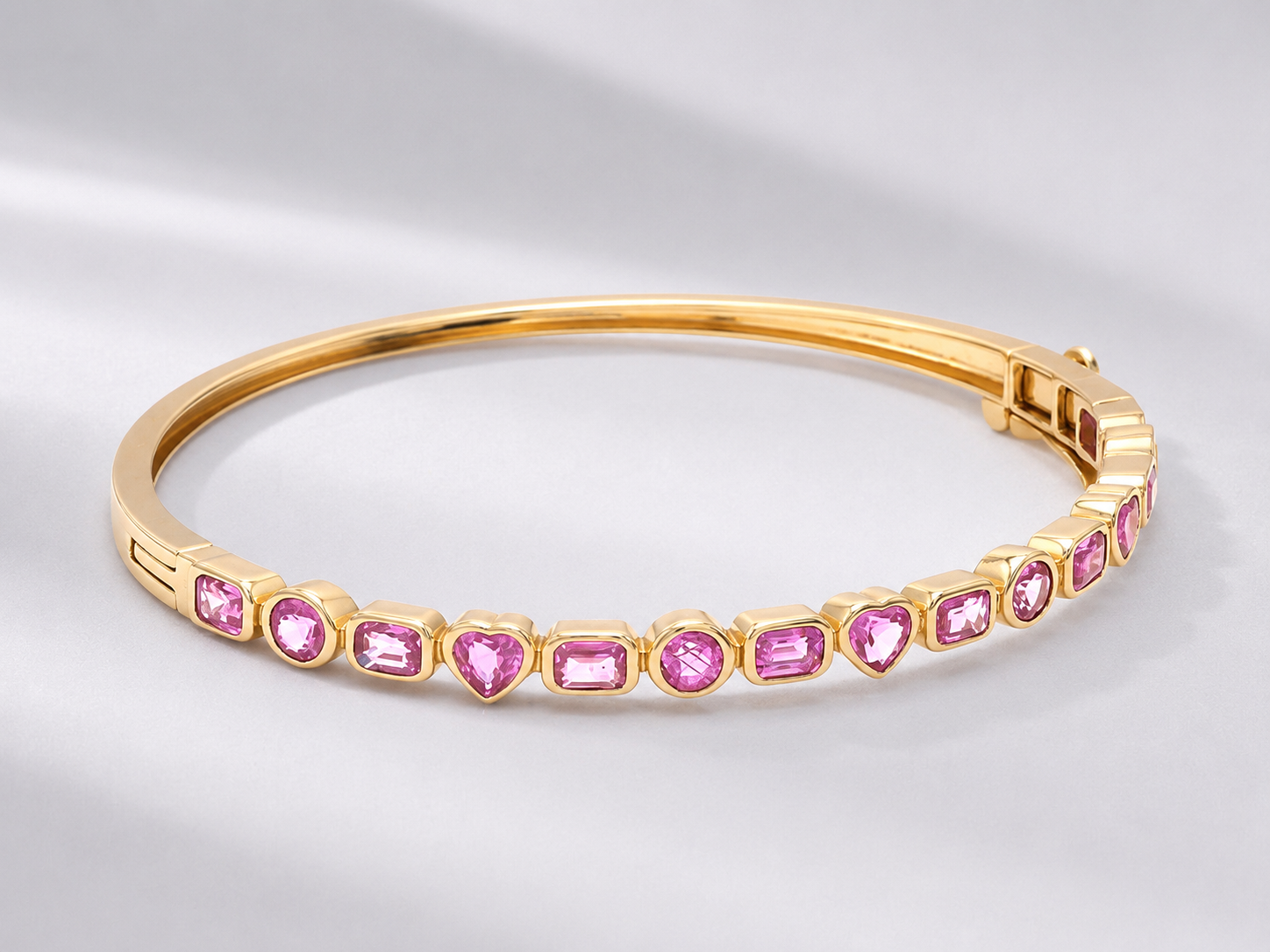 Natural Pink Sapphire Bezel Set Cuff Bracelet in 18K Gold