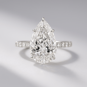 4 Carat Pear Cut Hidden Halo Engagement Ring with Pave Band - Evara Jewelry LLC