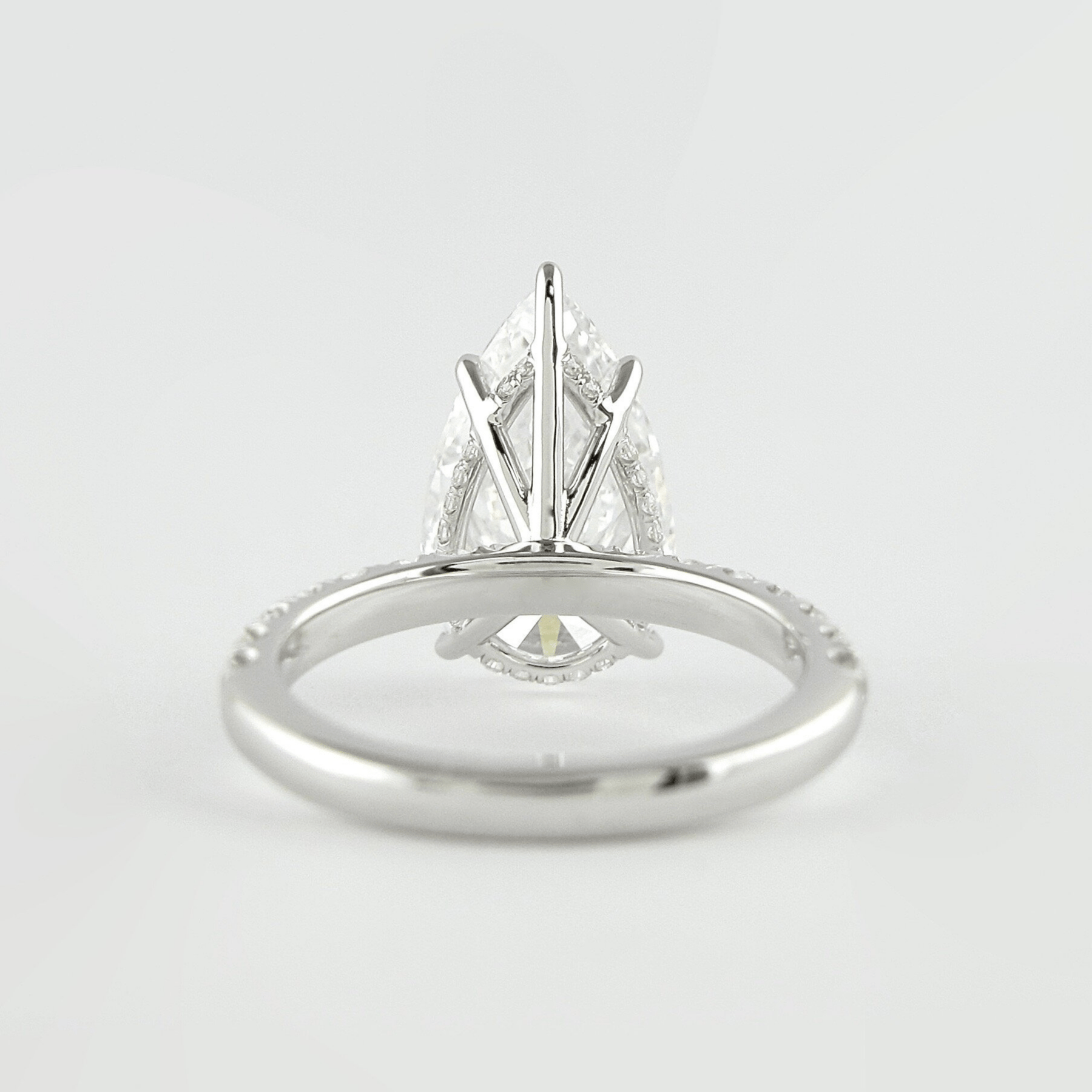 4 Carat Pear Cut Hidden Halo Engagement Ring with Pave Band - Evara Jewelry LLC