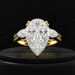 7 Carat Pear Cut Diamond Three Stone Ring with Accent Pear Diamonds - Evara Jewelry LLC