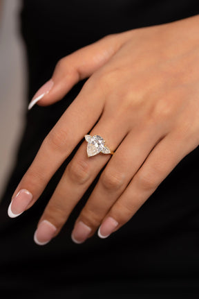 7 Carat Pear Cut Diamond Three Stone Ring with Accent Pear Diamonds - Evara Jewelry LLC