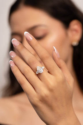 7 Carat Pear Cut Diamond Three Stone Ring with Accent Pear Diamonds - Evara Jewelry LLC