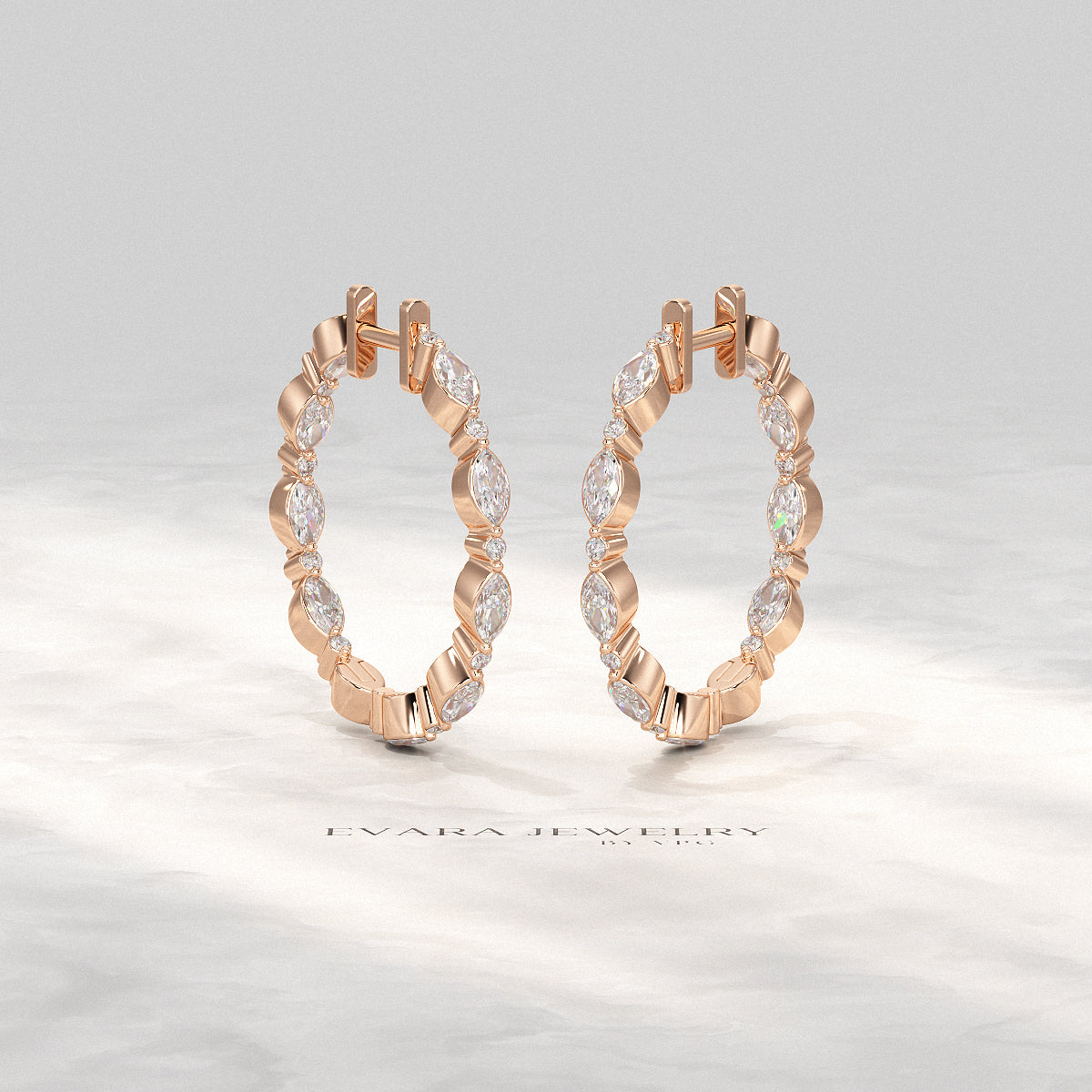 Close-up of marquise and round cut stones forming Morse code pattern on hoop earrings.