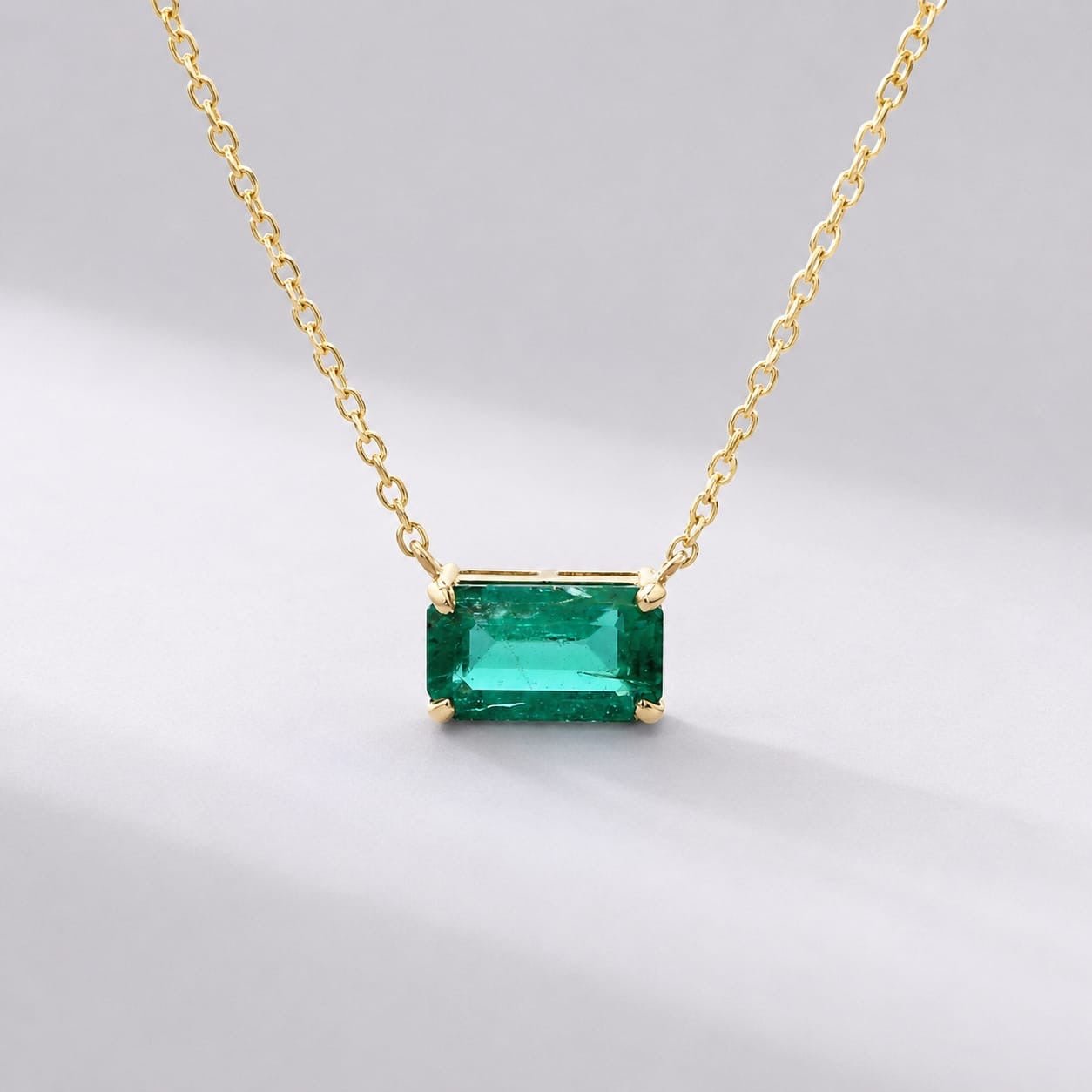 Natural East-West Emerald-Cut Emerald Pendant Necklace in 14K Gold - Evara Jewelry LLC