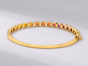 Natural Rainbow Sapphire Bezel-Set Oval Cuff Bangle in 14K Gold - Evara Jewelry LLC