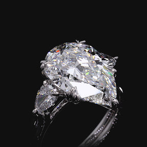 7 Carat Pear Cut Diamond Three Stone Ring with Accent Pear Diamonds